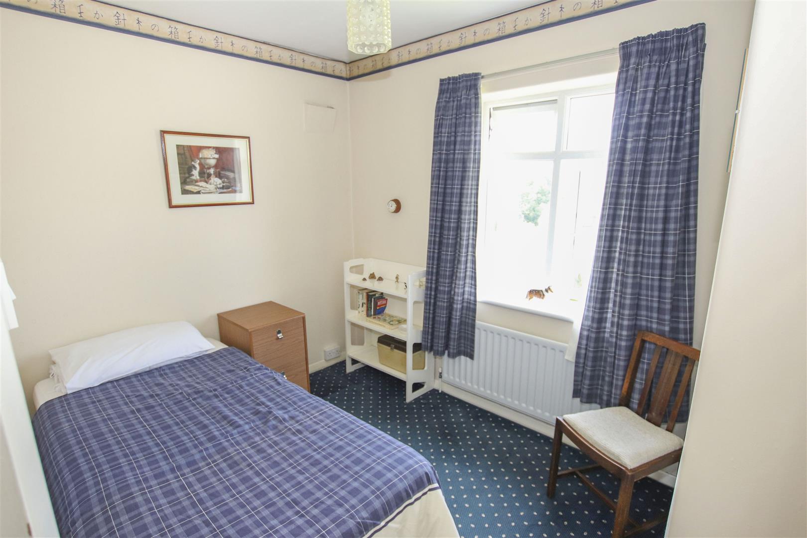 BEDROOM THREE (REAR)